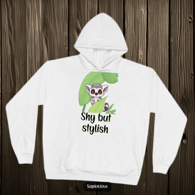 Funny kawaii lemur hoodie, a shy character peeking from behind a large jungle leaf, cozy and humorous apparel.